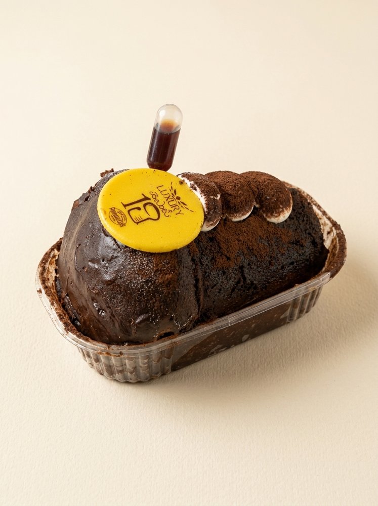 Babamisù 19, babà al caffè con mascarpone e cacao
